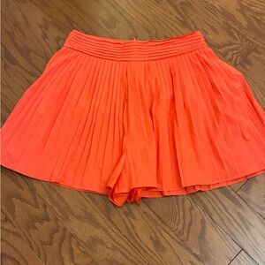 DO+BE Vibrant Coral Pleated Skort